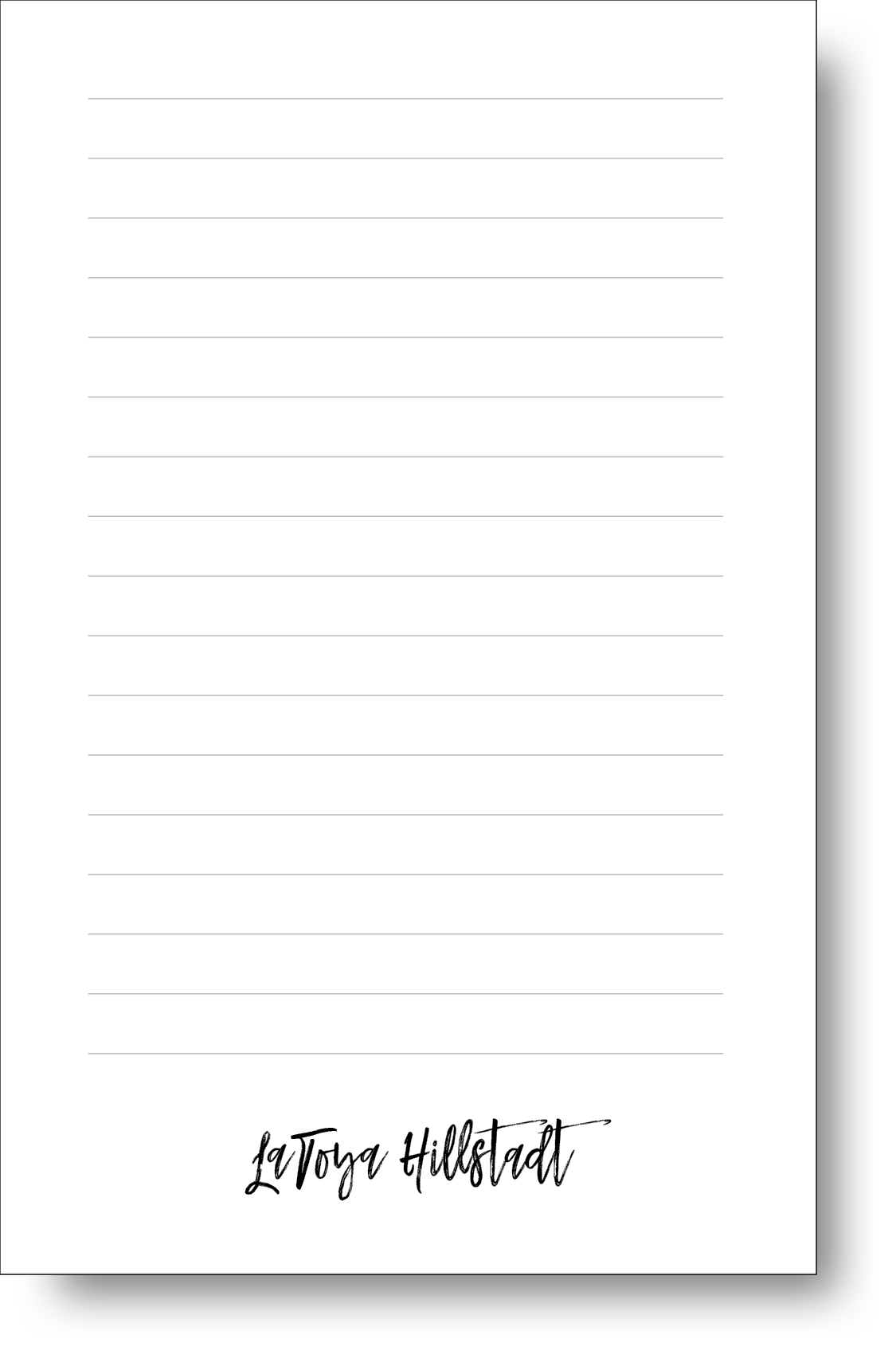 A black and white notepad featuring a stylish handwritten font displaying a name at the bottom.