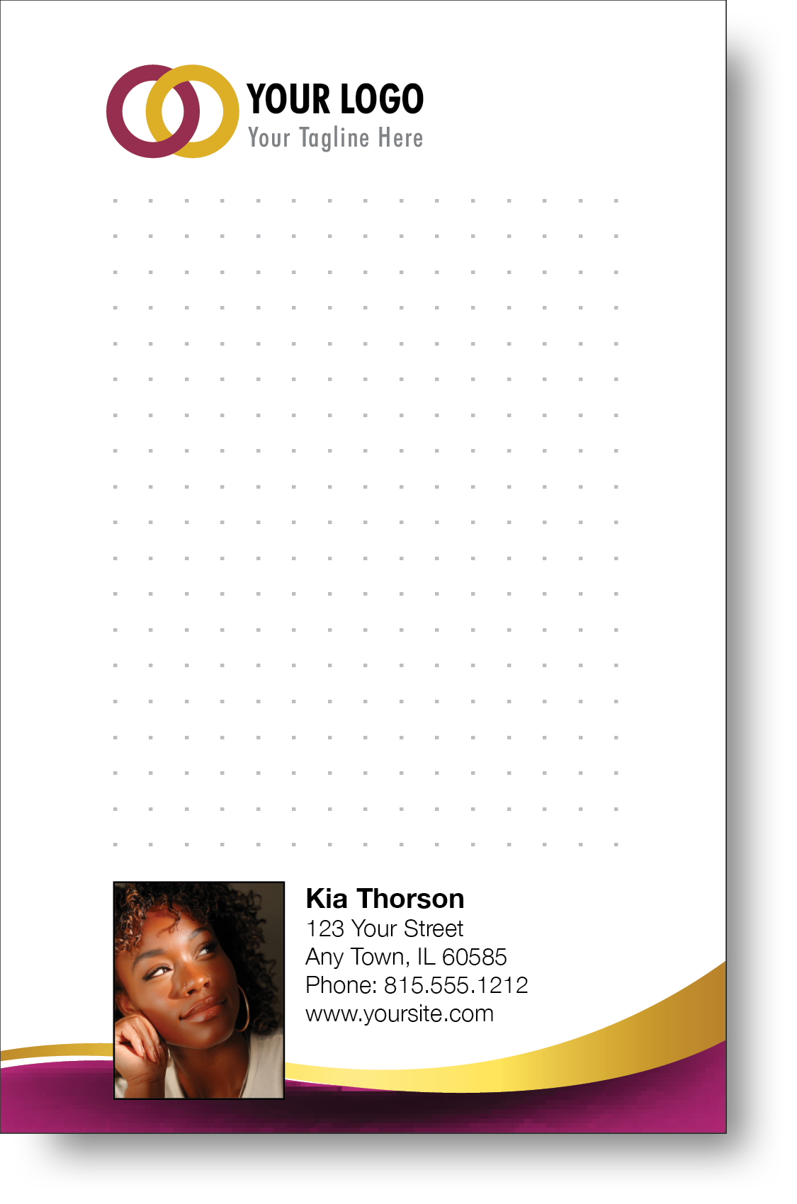 A colorful professional notepad presenting a company logo and a portrait with a name and contact information displayed.
