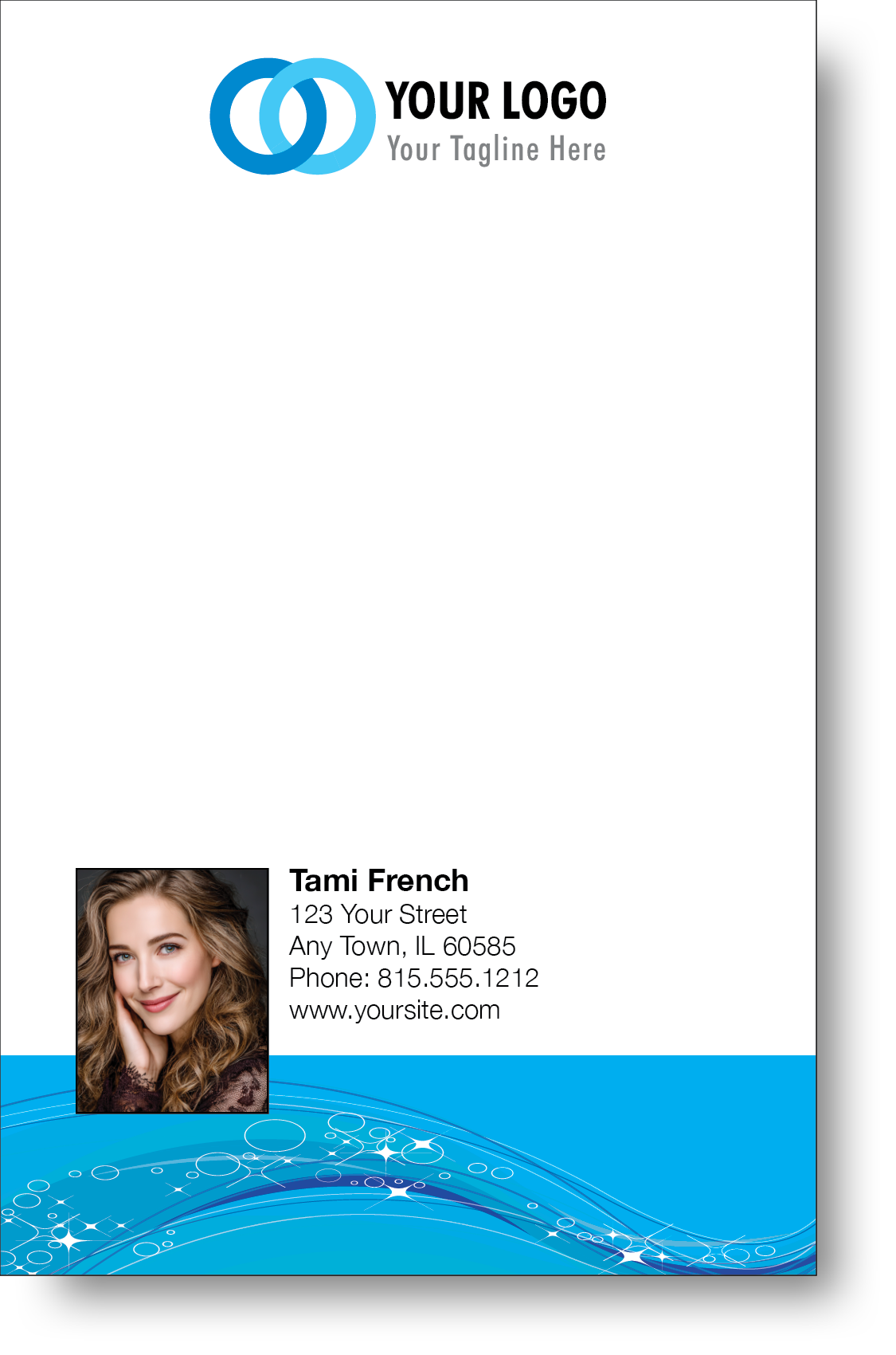 A colorful professional notepad presenting a company logo and a portrait with a name and contact information displayed.