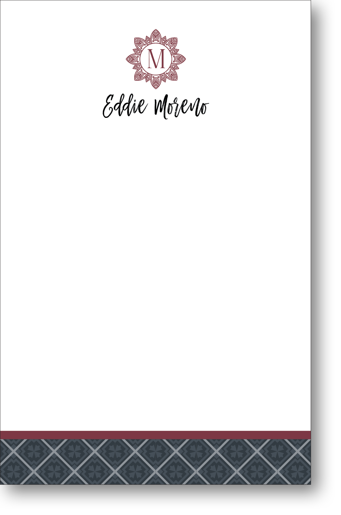 A colorful personalized notepad with a monogram at the top and a pastel colored block of geometric art at the bottom.