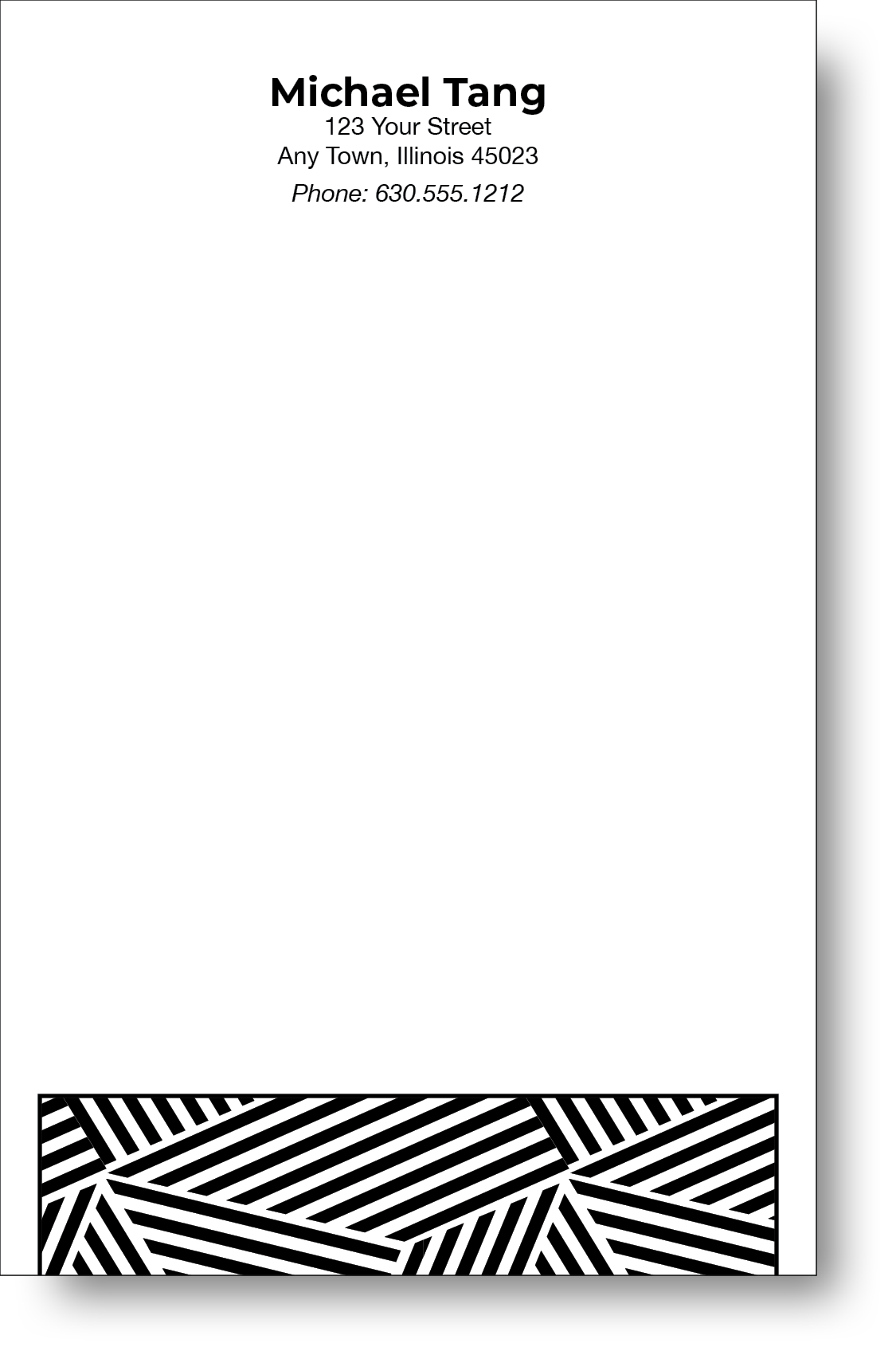 A black and white notepad with a geometric design on the bottom and a name and contact information on the top.