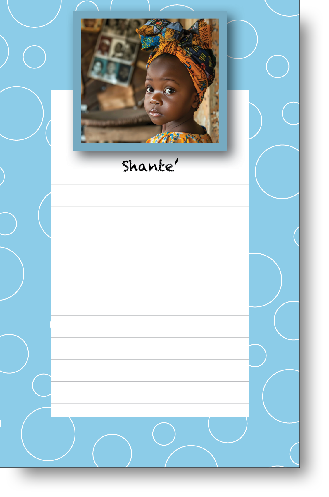 A colorful personalized notepad with a family photo displayed at the top surrounded by geometric style border.