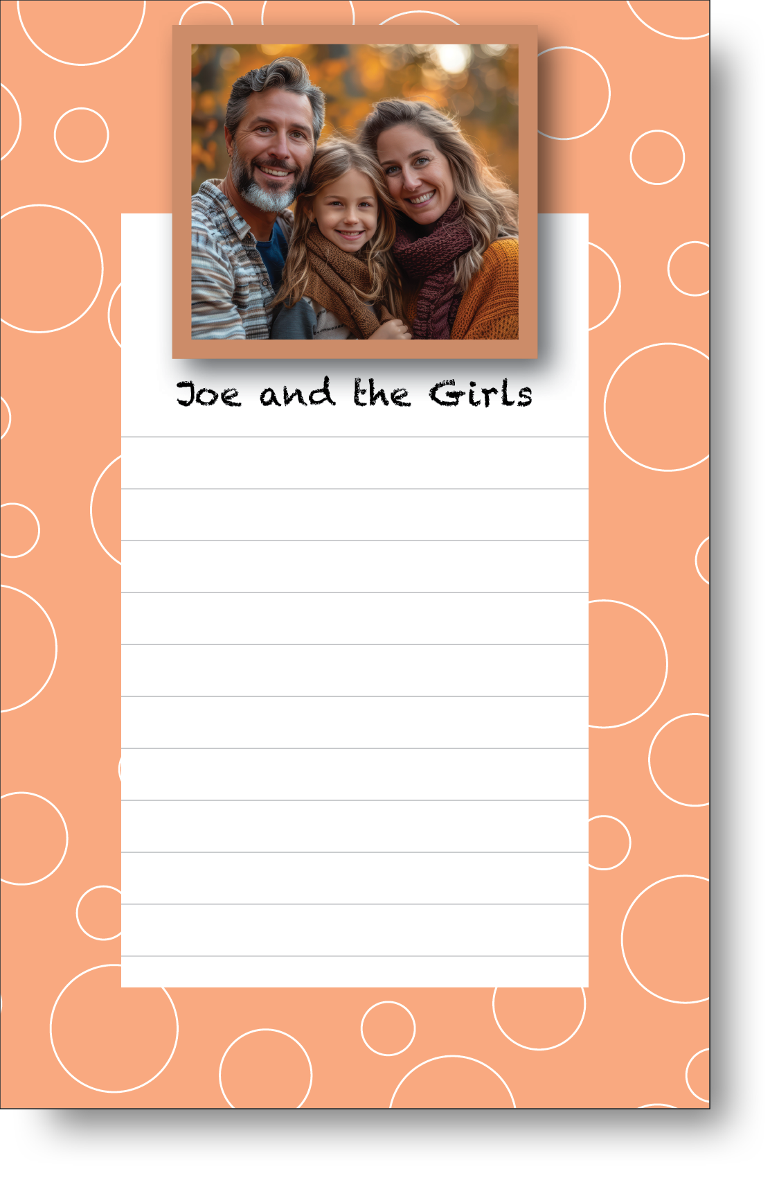 A colorful personalized notepad with a family photo displayed at the top surrounded by geometric style border.